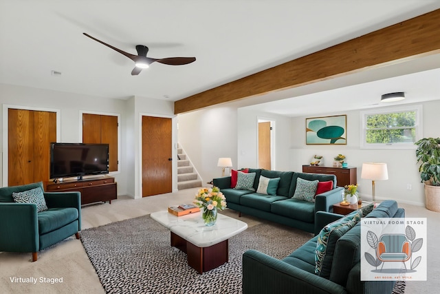 5082 Patland Dr, Kalamazoo, MI 49009 - living room featuring light colored carpet, stairs, and a ceiling fan
