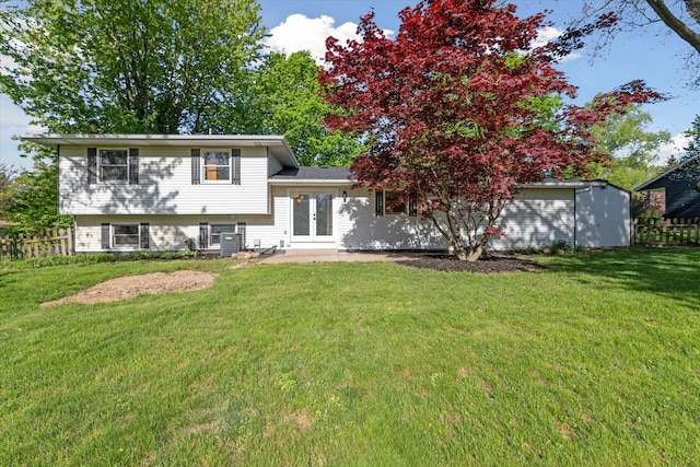 5082 Patland Dr, Kalamazoo, MI 49009 - back of house featuring french doors, central AC unit, and a patio
