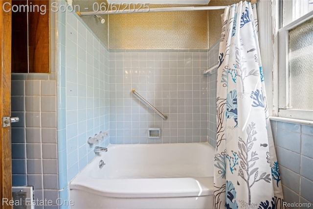 2209 Ridgemont Rd, Grosse Pointe Woods, MI 48236 - bathroom with tile walls and shower / bath combo with shower curtain