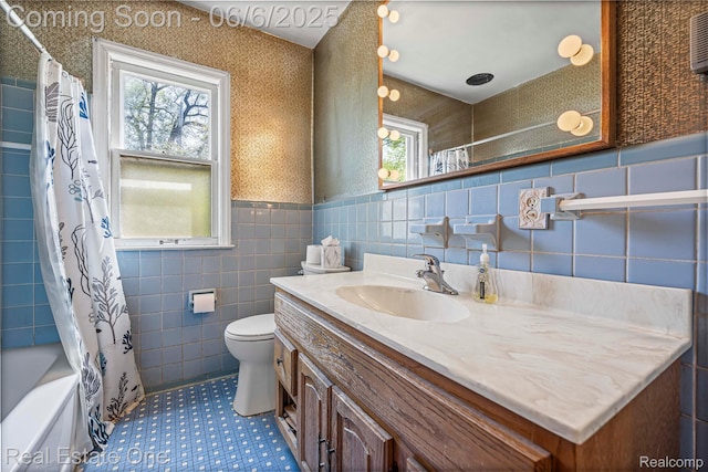 2209 Ridgemont Rd, Grosse Pointe Woods, MI 48236 - bathroom featuring healthy amount of natural light, vanity, tile walls, toilet, and shower / bath combination with curtain