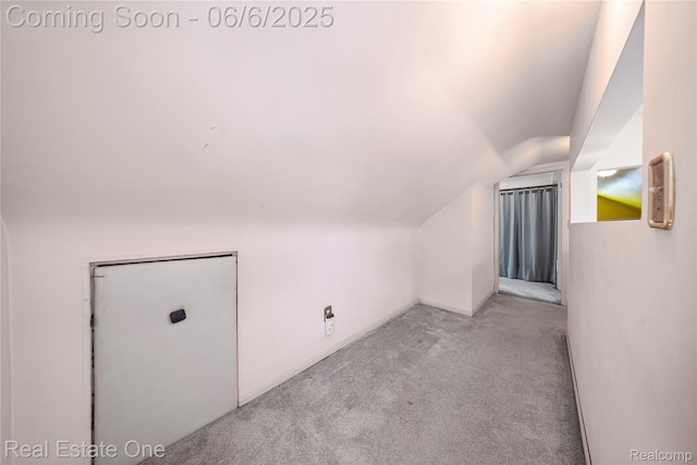 2209 Ridgemont Rd, Grosse Pointe Woods, MI 48236 - additional living space with lofted ceiling and light carpet
