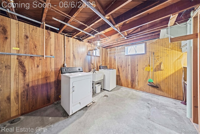 2209 Ridgemont Rd, Grosse Pointe Woods, MI 48236 - laundry area featuring washer and dryer and wooden walls
