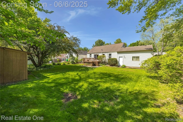 2209 Ridgemont Rd, Grosse Pointe Woods, MI 48236 - view of grassy yard with a deck