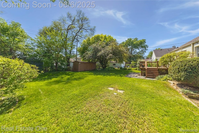2209 Ridgemont Rd, Grosse Pointe Woods, MI 48236 - view of yard featuring a wooden deck and stairway