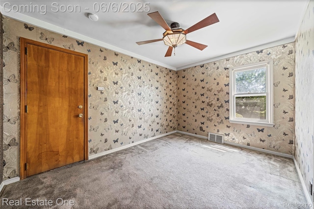 2209 Ridgemont Rd, Grosse Pointe Woods, MI 48236 - spare room with carpet flooring, ceiling fan, wallpapered walls, baseboards, and crown molding