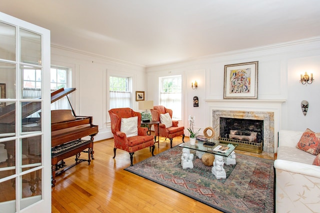 736 Chicago Blvd, Detroit, MI 48202 - living area with crown molding, wood-type flooring, and a high end fireplace