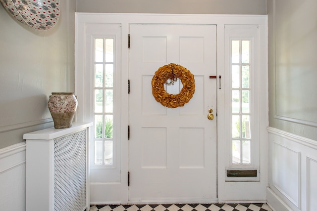 736 Chicago Blvd, Detroit, MI 48202 - foyer entrance with a decorative wall, healthy amount of natural light, and a wainscoted wall