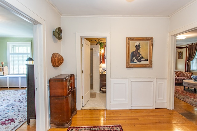 736 Chicago Blvd, Detroit, MI 48202 - hallway with light wood-type flooring and ornamental molding