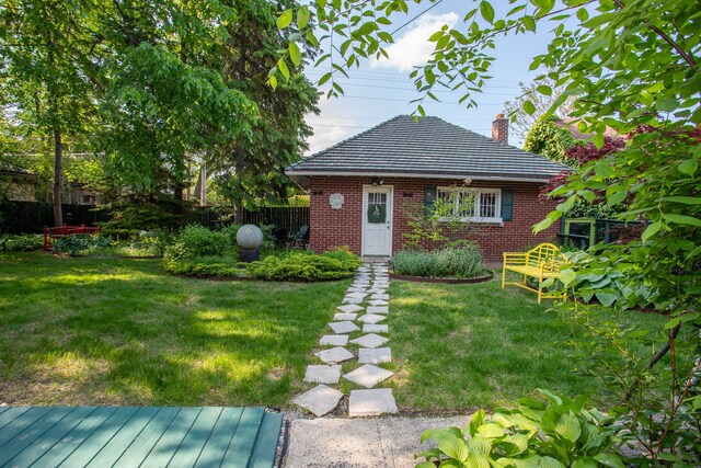 736 Chicago Blvd, Detroit, MI 48202 - view of front of home featuring brick siding and a chimney
