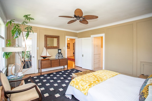 736 Chicago Blvd, Detroit, MI 48202 - bedroom featuring a decorative wall, access to outside, crown molding, and ensuite bathroom