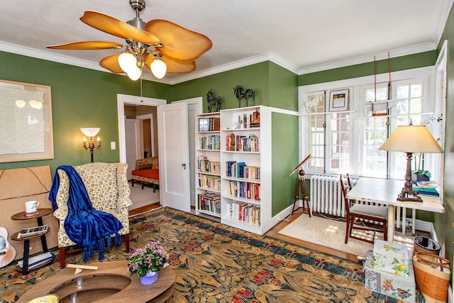 736 Chicago Blvd, Detroit, MI 48202 - living area featuring radiator heating unit, ornamental molding, baseboards, and ceiling fan
