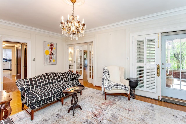 736 Chicago Blvd, Detroit, MI 48202 - living area with ornamental molding, a chandelier, french doors, and wood finished floors