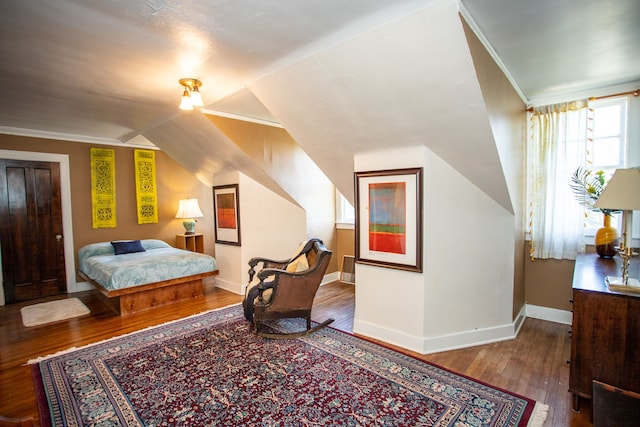 736 Chicago Blvd, Detroit, MI 48202 - bedroom featuring hardwood / wood-style flooring, baseboards, and vaulted ceiling