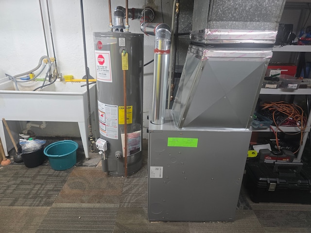 26541 Warner Ave, Warren, MI 48091 - utility room featuring water heater