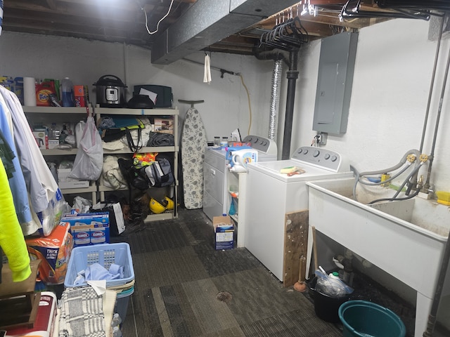26541 Warner Ave, Warren, MI 48091 - clothes washing area with washer and dryer, electric panel, and carpet flooring