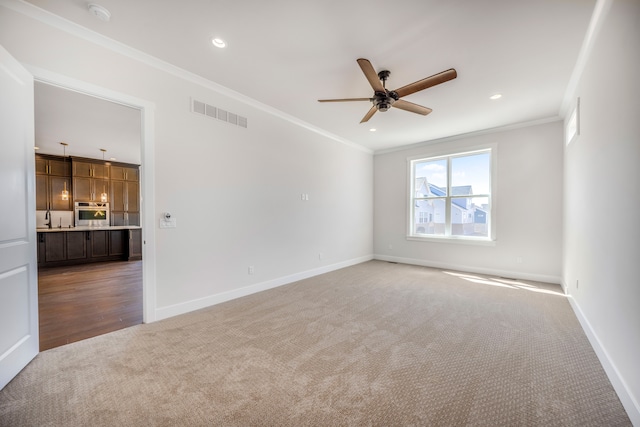 5636 Suffolk Ct, West Bloomfield, MI 48322 - carpeted empty room with a ceiling fan, ornamental molding, a smoke detector, baseboards, and recessed lighting