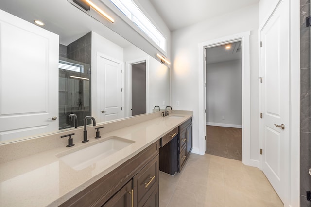 5636 Suffolk Ct, West Bloomfield, MI 48322 - full bath featuring a shower stall, double vanity, tile patterned flooring, and baseboards