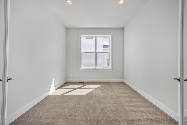 5636 Suffolk Ct, West Bloomfield, MI 48322 - spare room with light colored carpet, recessed lighting, and baseboards