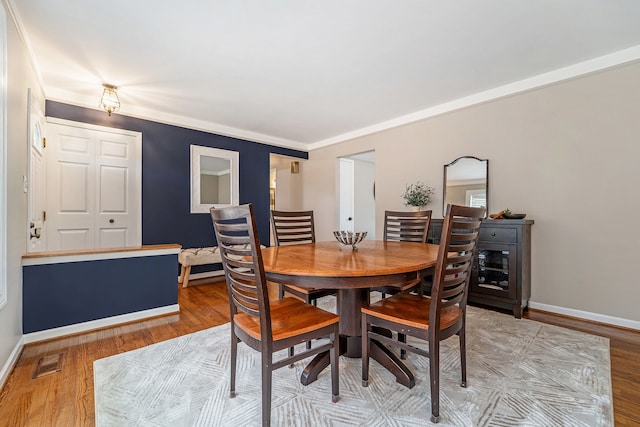 33466 Brownlea Dr, Sterling Heights, MI 48312 - dining area with light wood-style floors and baseboards