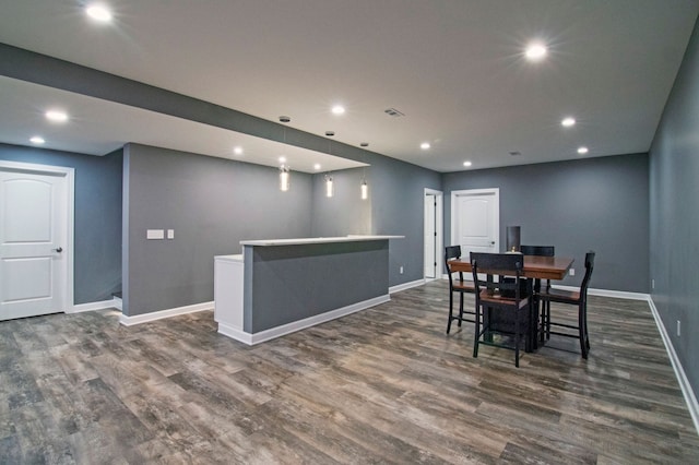 194 W Reed Lk, Commerce Twp, MI 48390 - dining area featuring dark wood-type flooring, baseboards, and recessed lighting
