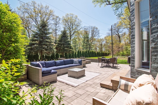 194 W Reed Lk, Commerce Twp, MI 48390 - view of patio / terrace with an outdoor living space and outdoor dining area