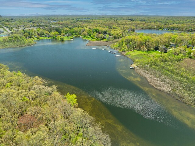 194 W Reed Lk, Commerce Twp, MI 48390 - aerial overview of property's location featuring a heavily wooded area and a large body of water