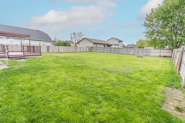 11748 Cloverview Dr, Ravenna, MI 49451 - view of yard with a wooden deck