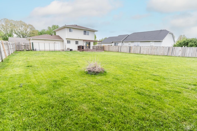 11748 Cloverview Dr, Ravenna, MI 49451 - view of yard with a wooden deck