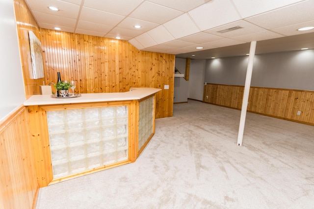 11748 Cloverview Dr, Ravenna, MI 49451 - indoor dry bar featuring carpet flooring, wood walls, a wainscoted wall, and recessed lighting