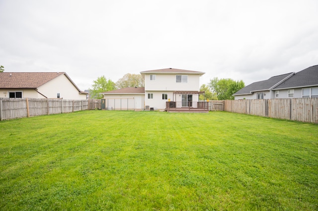 11748 Cloverview Dr, Ravenna, MI 49451 - rear view of house featuring a deck and central air condition unit