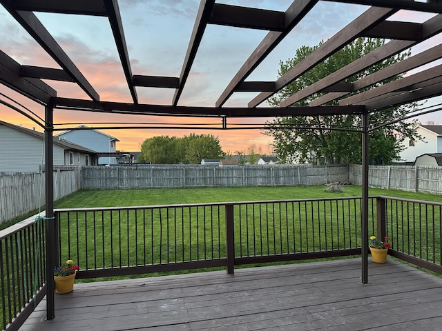 11748 Cloverview Dr, Ravenna, MI 49451 - deck at dusk with a pergola