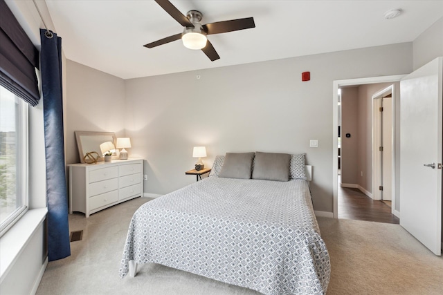 293 N 2nd St, Brighton, MI 48116 - bedroom featuring light colored carpet, ceiling fan, and baseboards