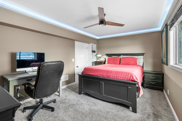 08763 Silver Lake Rd, Grand Junction, MI 49056 - carpeted bedroom with ceiling fan, a desk, and baseboards