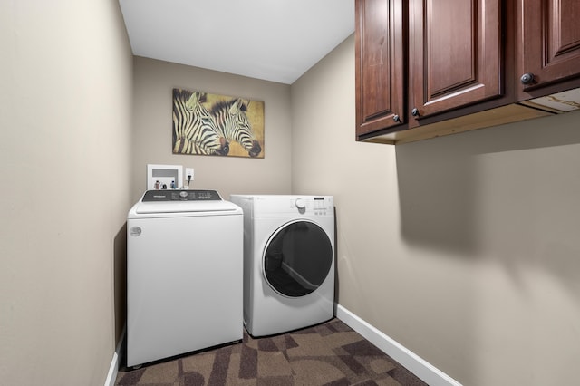 08763 Silver Lake Rd, Grand Junction, MI 49056 - laundry area with washer and clothes dryer, cabinet space, and baseboards
