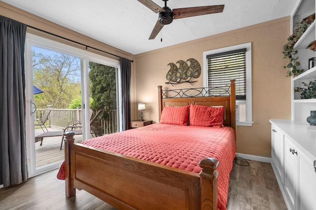 08763 Silver Lake Rd, Grand Junction, MI 49056 - bedroom featuring access to outside, light wood-type flooring, a textured wall, ceiling fan, and baseboards