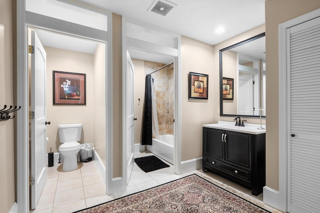 08763 Silver Lake Rd, Grand Junction, MI 49056 - full bathroom with tile patterned floors, toilet, vanity, baseboards, and shower / tub combo with curtain