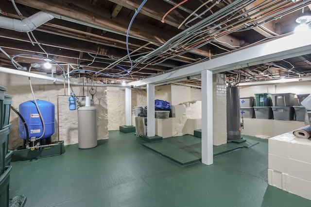 08763 Silver Lake Rd, Grand Junction, MI 49056 - unfinished below grade area with a water softener system and a water pressure tank
