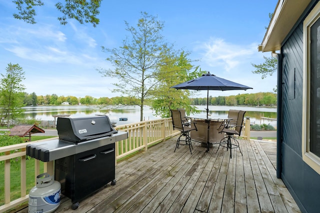 08763 Silver Lake Rd, Grand Junction, MI 49056 - wooden deck featuring a water view and grilling area