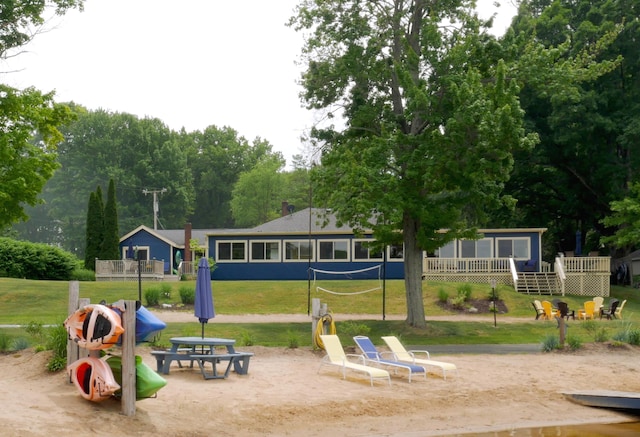 08763 Silver Lake Rd, Grand Junction, MI 49056 - view of play area with a lawn and a wooden deck