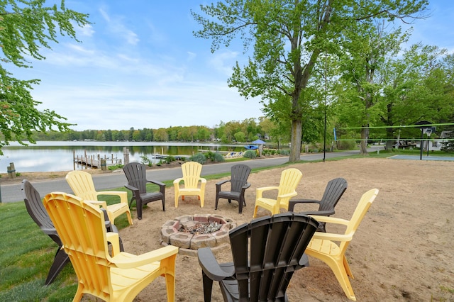 08763 Silver Lake Rd, Grand Junction, MI 49056 - view of patio / terrace featuring a fire pit and a water view