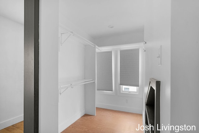 957 Breton Rd SE, Grand Rapids, MI 49506 - spacious closet featuring light wood finished floors