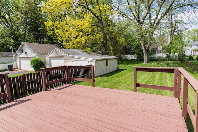 wooden deck with an outdoor structure, a garage, and view of scattered trees