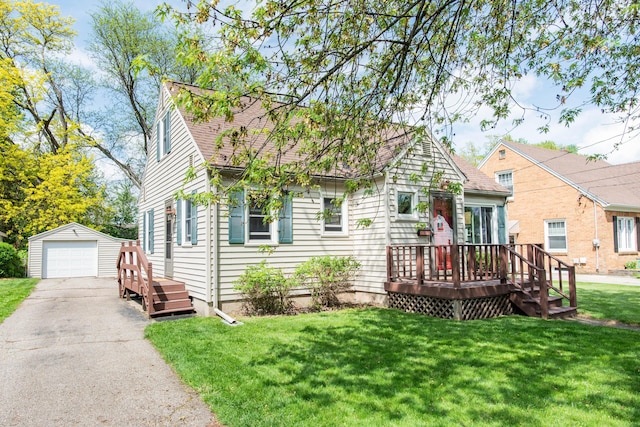 view of front of home with an outdoor structure, a wooden deck, asphalt driveway, a front yard, and a garage