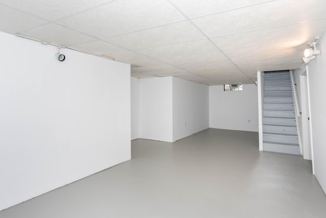finished basement featuring stairs