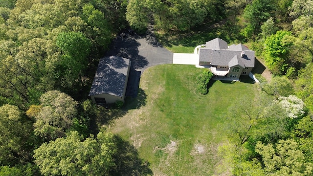 aerial overview of property's location featuring a forest