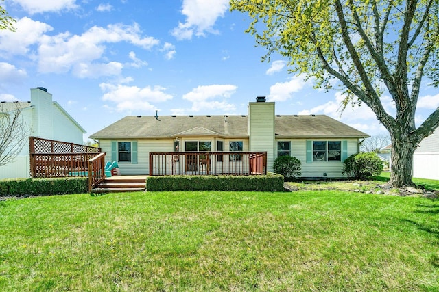 3124 Setting Sun Blvd, Saginaw, MI 48603 - rear view of house featuring a deck, a chimney, and a lawn