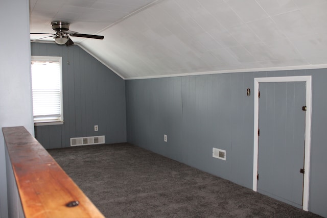 20091 Bentler St, Detroit, MI 48219 - additional living space featuring carpet, a ceiling fan, vaulted ceiling, and wooden walls