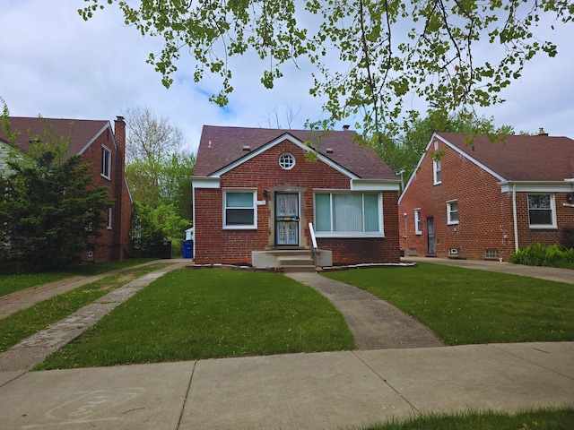 20091 Bentler St, Detroit, MI 48219 - bungalow-style home with brick siding and a front yard