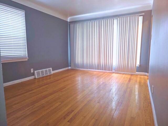 20091 Bentler St, Detroit, MI 48219 - unfurnished room featuring wood-type flooring and baseboards