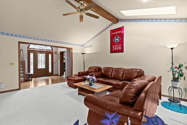46890 Cider Mill Dr, Novi, MI 48374 - carpeted living room with a skylight, a ceiling fan, and baseboards